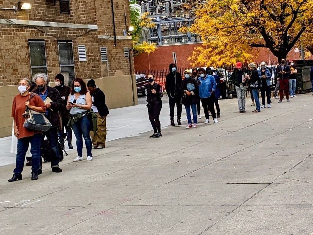 Voters in New York City line up to cast early U.S. election ballots in late October