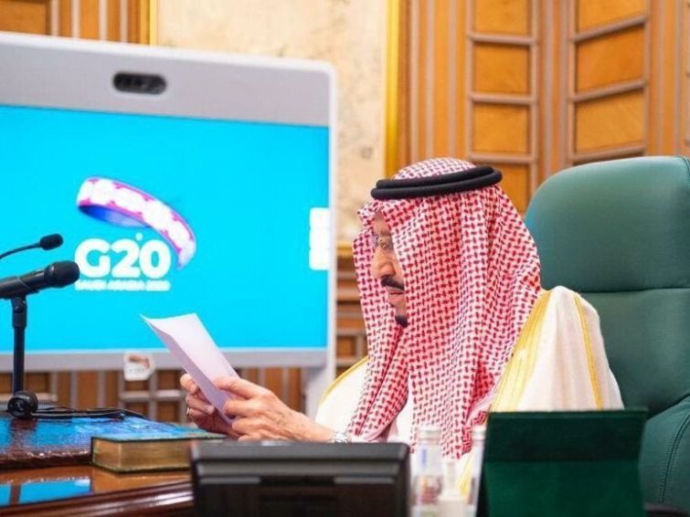 Saudi Arabia's King Salman speaks by video link at a G-20 summit on March 26, 2020