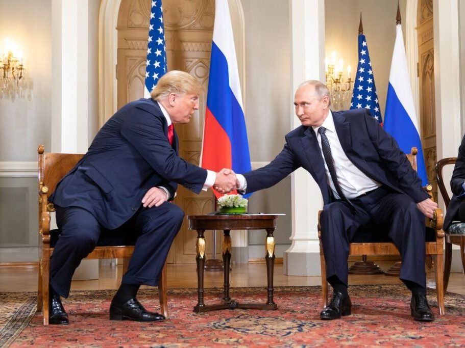 U.S. President Donald Trump and Russian President Vladimir Putin shake hands at Helsinki, Finland in July 2018