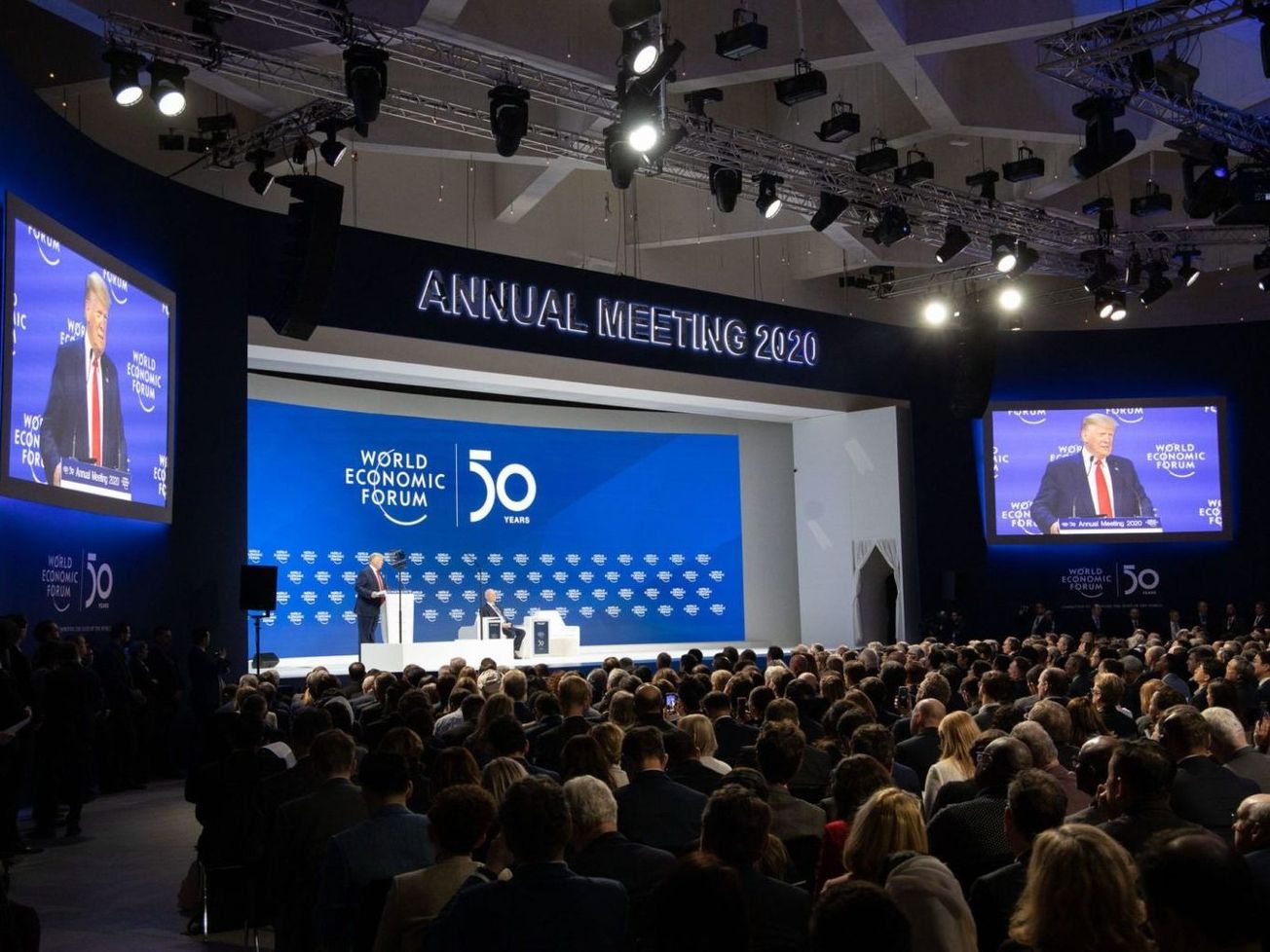 World Economic Forum participants watching U.S. President Donald J. Trump speak on January 21, 2020