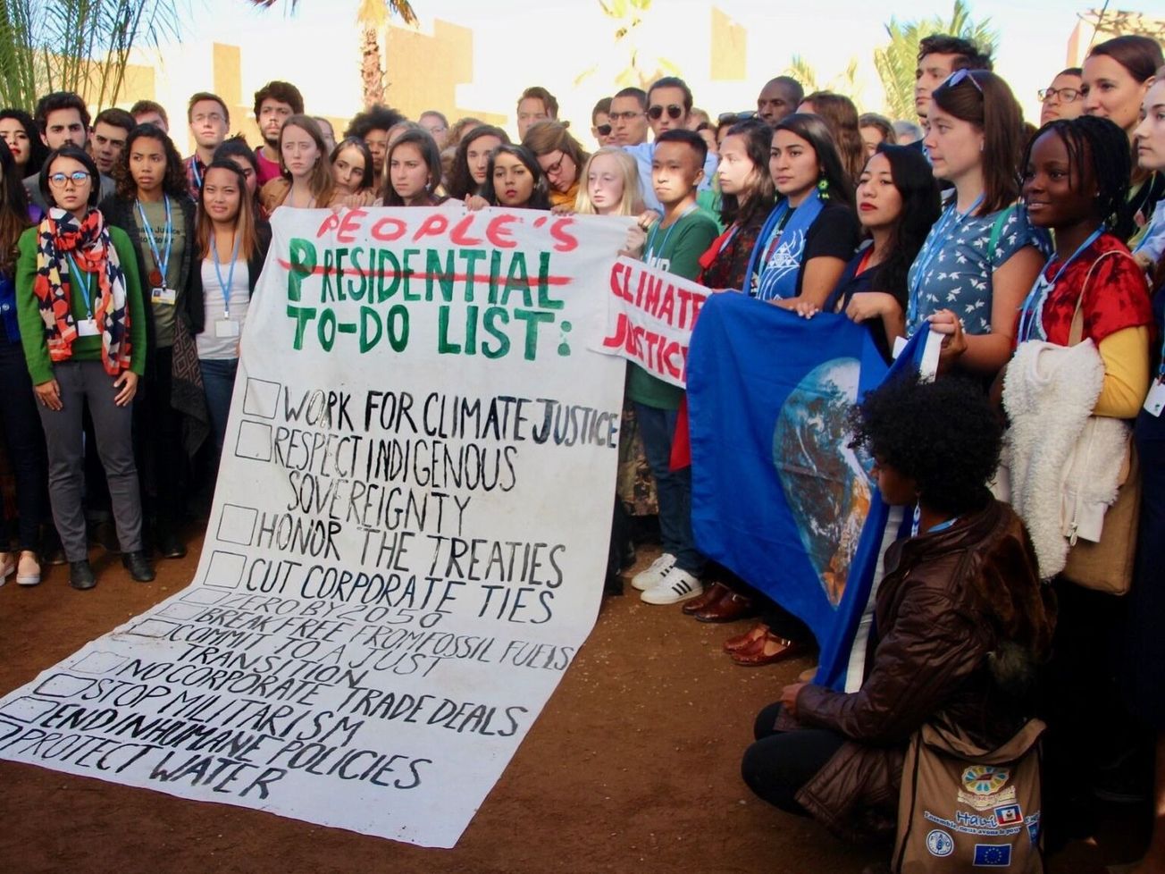 American students protest outside the 2016 U.N. climate talks in Morocco