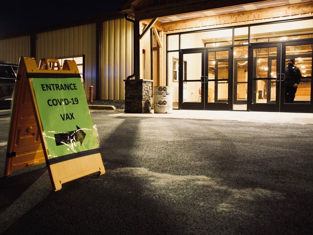 A U.S. vaccine center in Baltimore gives shots to health and emergency workers