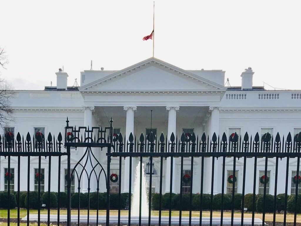 The White House with flag at half-staff in December 2018 in honor of former President George H.W. Bush