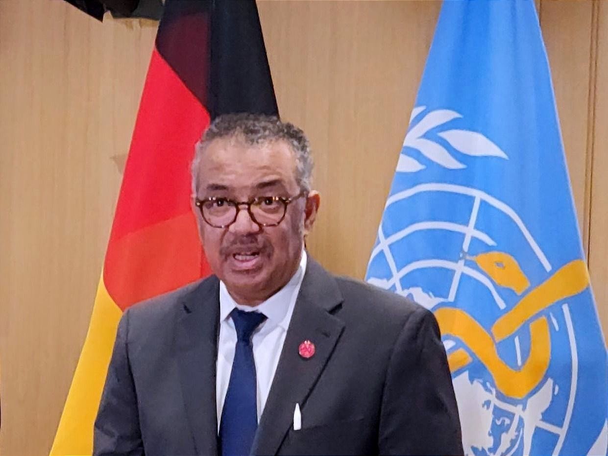 WHO chief Tedros Adhanom Ghebreyesus speaking with reporters