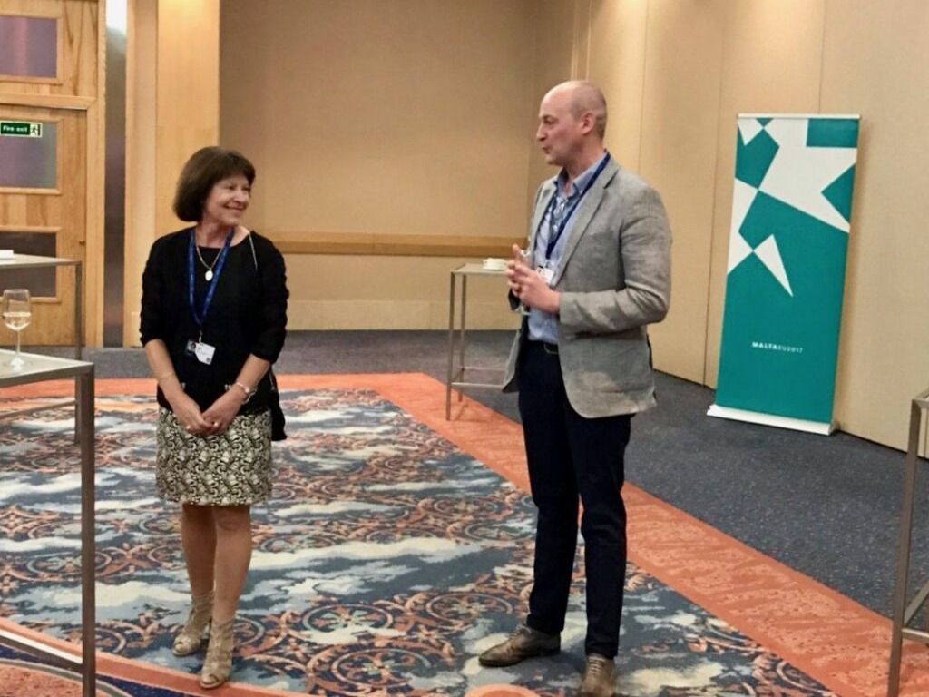WHO officials Francesco Zambon, right, and Piroska Östlin at a 2017 reception in Malta