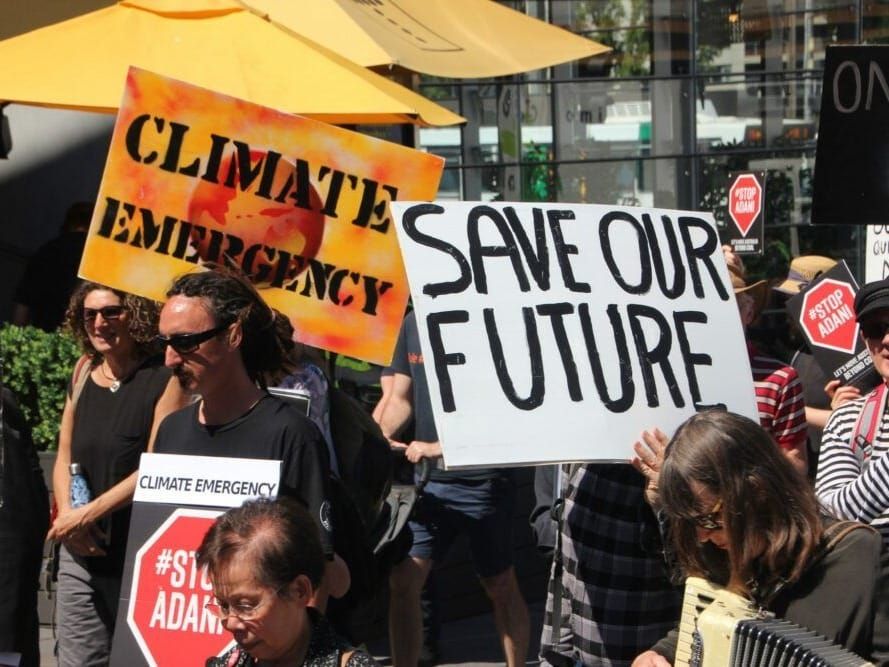 Protesters in Melbourne, Australia on the eve of the climate summit in Poland