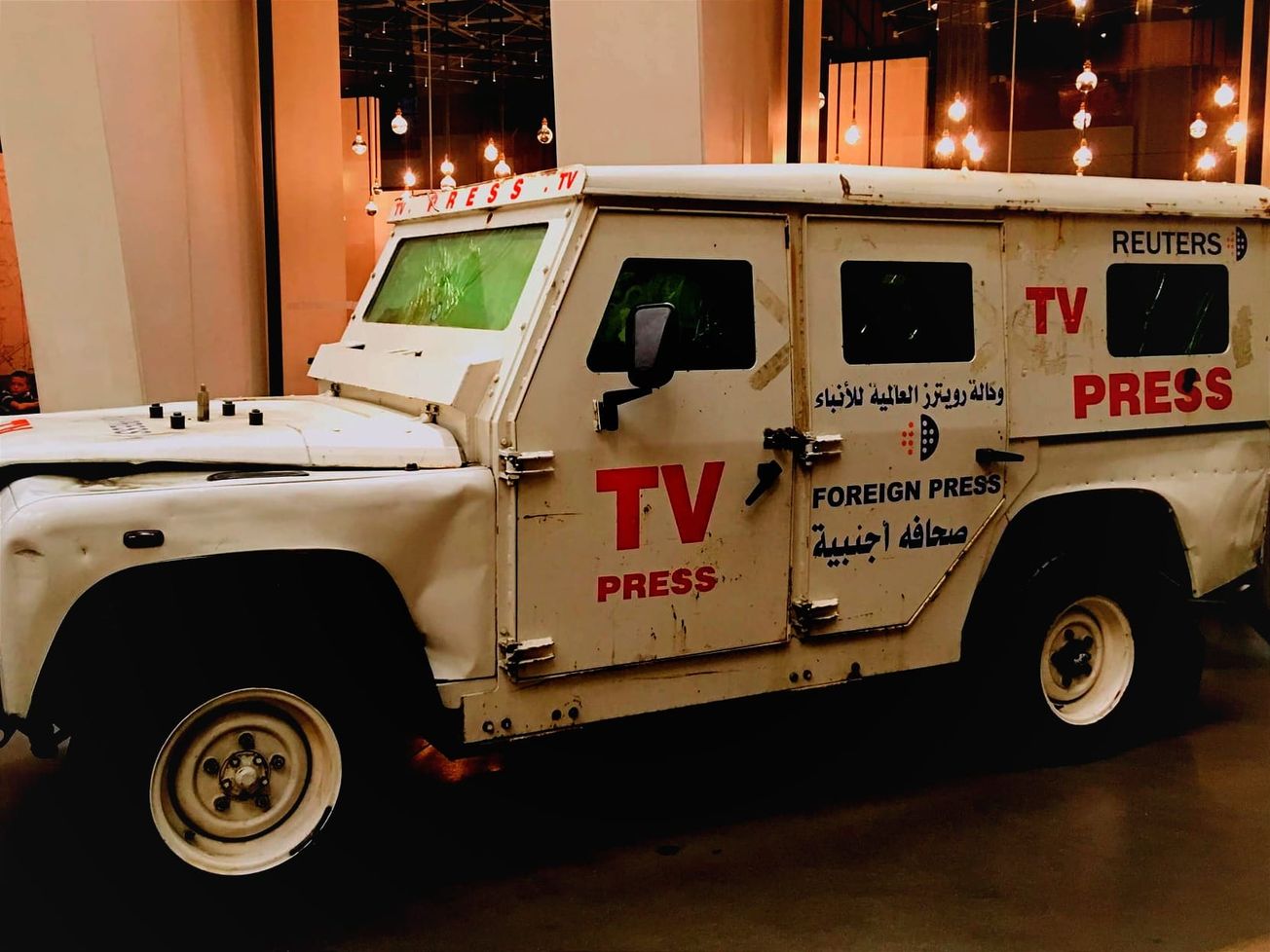 A Land Rover used by Reuters in Gaza is displayed at London's Imperial War Museum