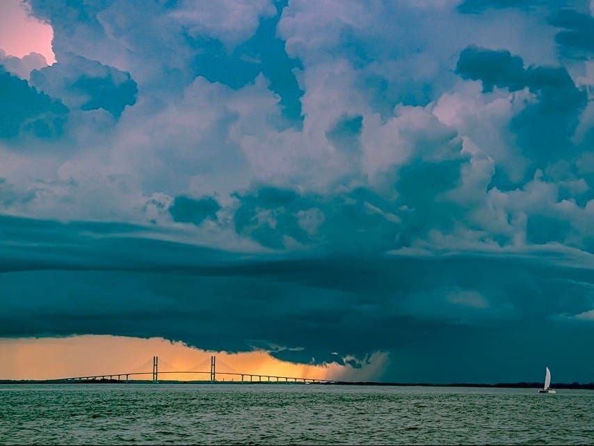 Thunderheads spawned by a tropical storm over western Florida sweep across St. Simons Sound in south Georgia