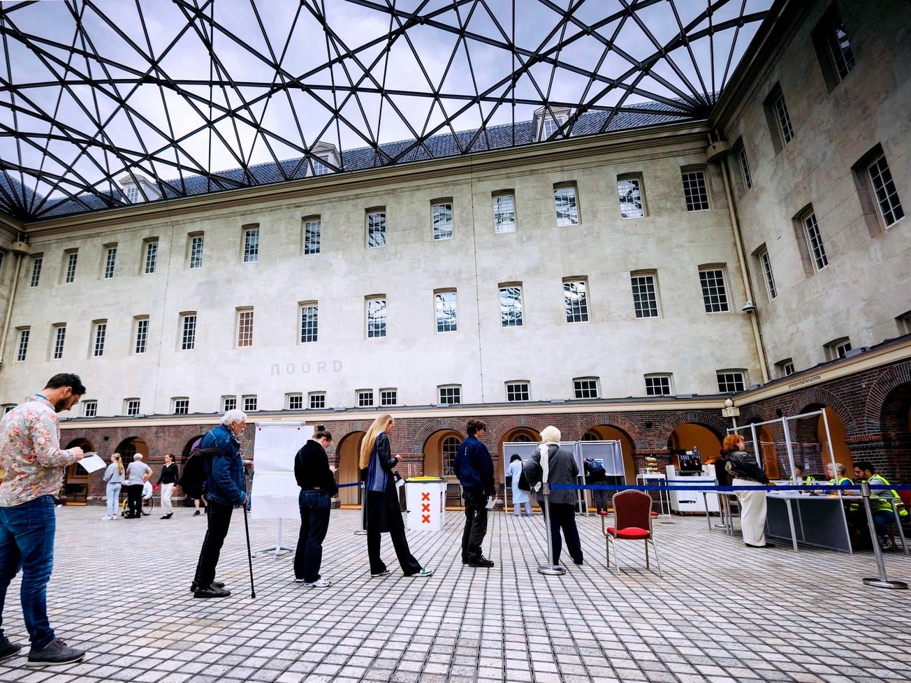 Amsterdam residents cast votes. 