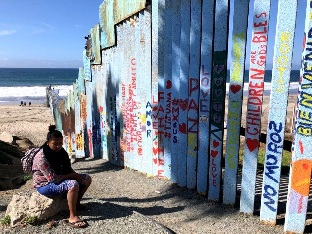 An asylum seeker by the U.S. border with Tijuana, Mexico