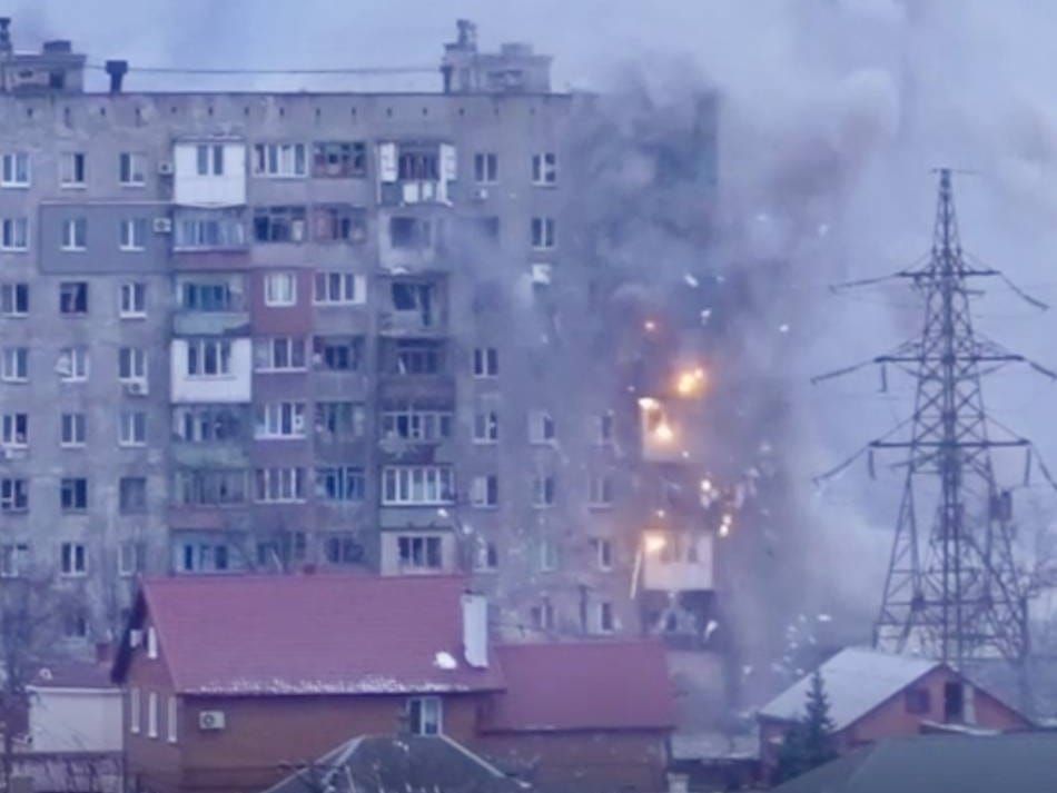 A residential building in Mariupol fired on by Russian tanks