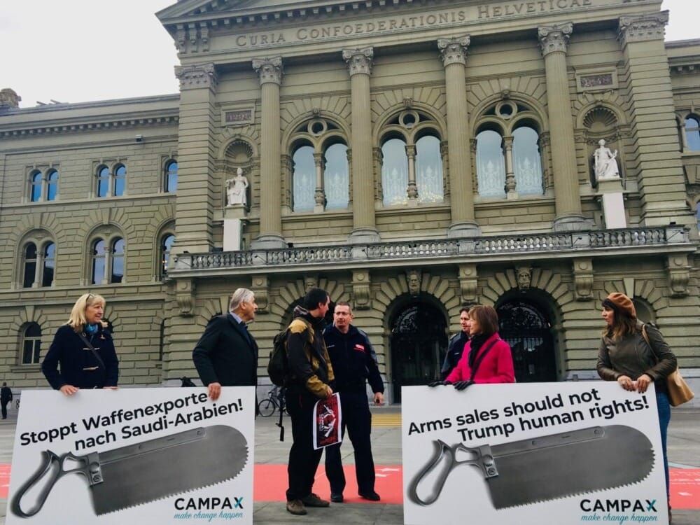 Protesters against global arms sales outside the Swiss Parliament Building
