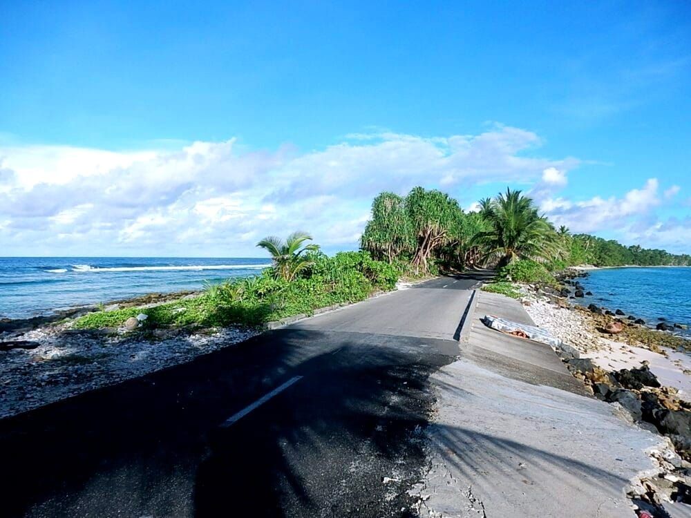 A narrow road in Tuvalu, an island nation on global warming's front lines. 