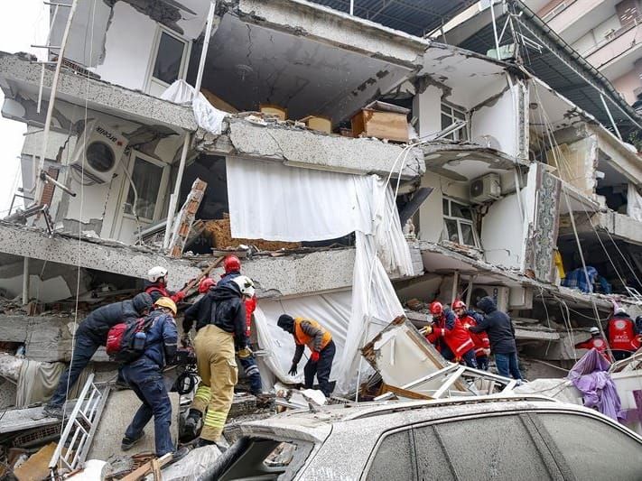 Aid workers try to reach victims in Turkey trapped in the rubble of the devastating 7.8-magnitude earthquake