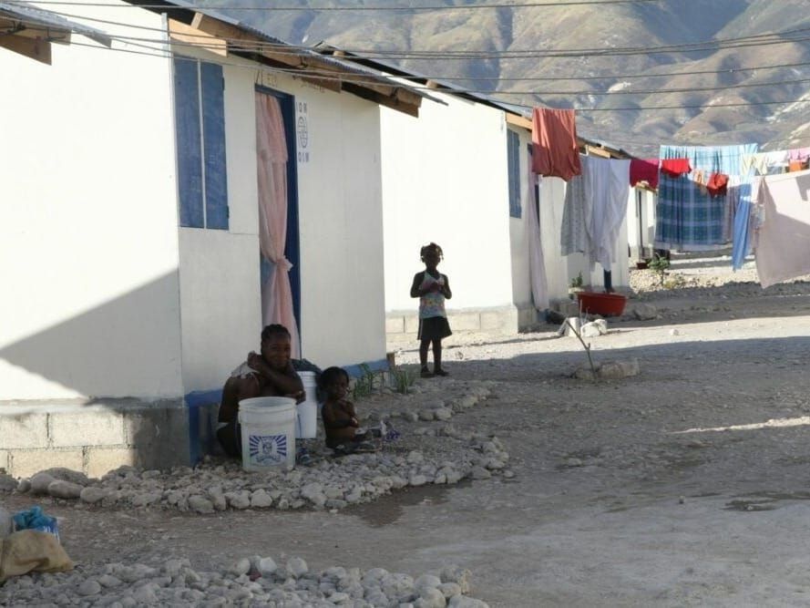 A family in Haiti's resettlement camp at Corail Cesselesse.
