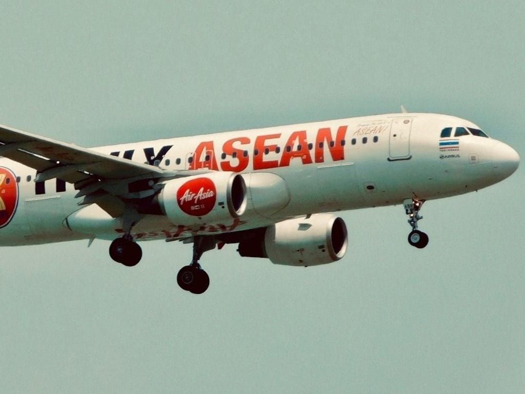 An AirAsia Airbus A320 proclaims "Truly ASEAN" to celebrate its sustainability partnership with ASEAN nations