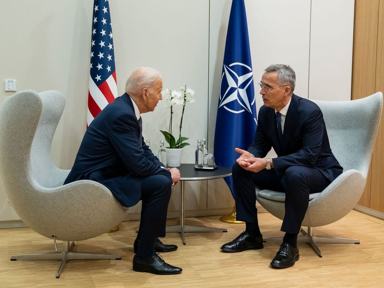 NATO Secretary General Jens Stoltenberg, right, meets with U.S. President Joe Biden at Brussels in March 2022.
