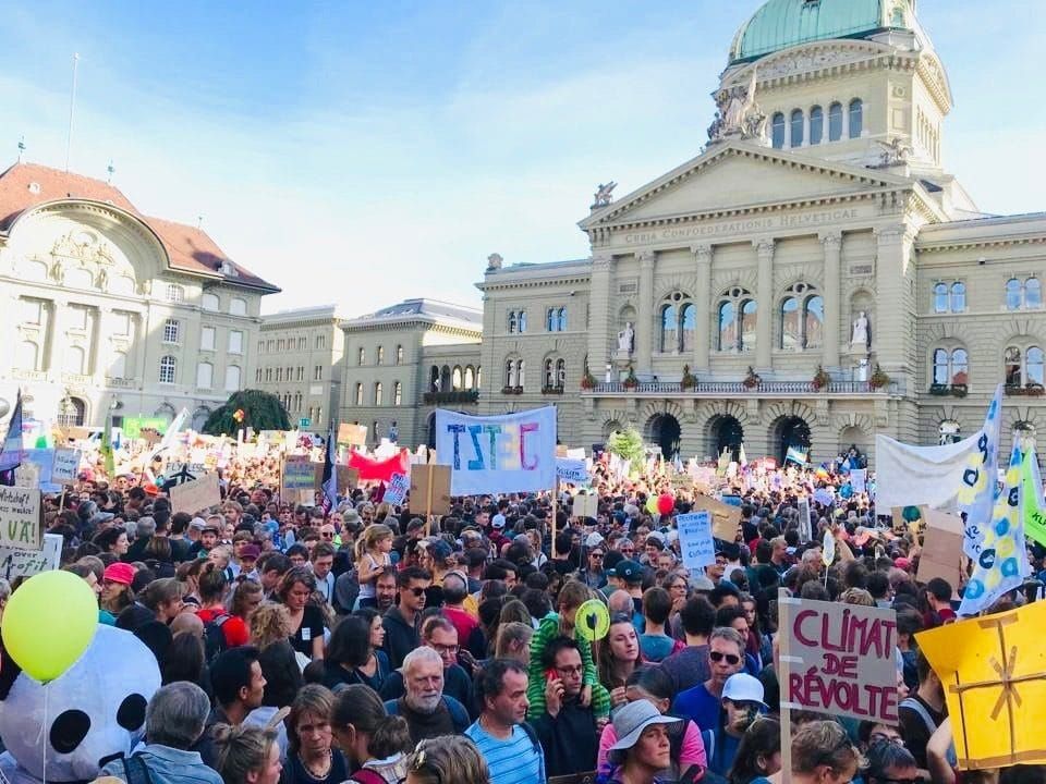 Climate protesters at Bern’s Bundesplatz, or Federal Square, in front of Swiss parliament