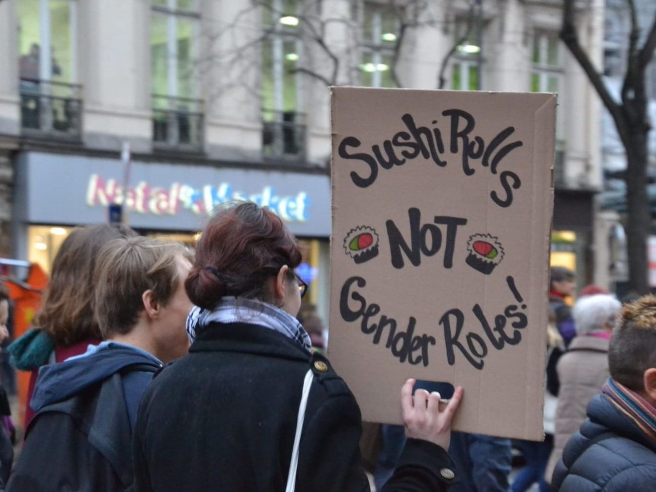 French demonstrators carry signs for women's rights at a Paris gathering in March 2017 (AN/Jeanne Menjoulet)