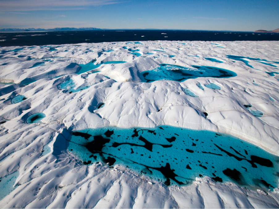 Aerial views of melt pools and melt rivers on Petermann Glacier in remote northwest Greenland