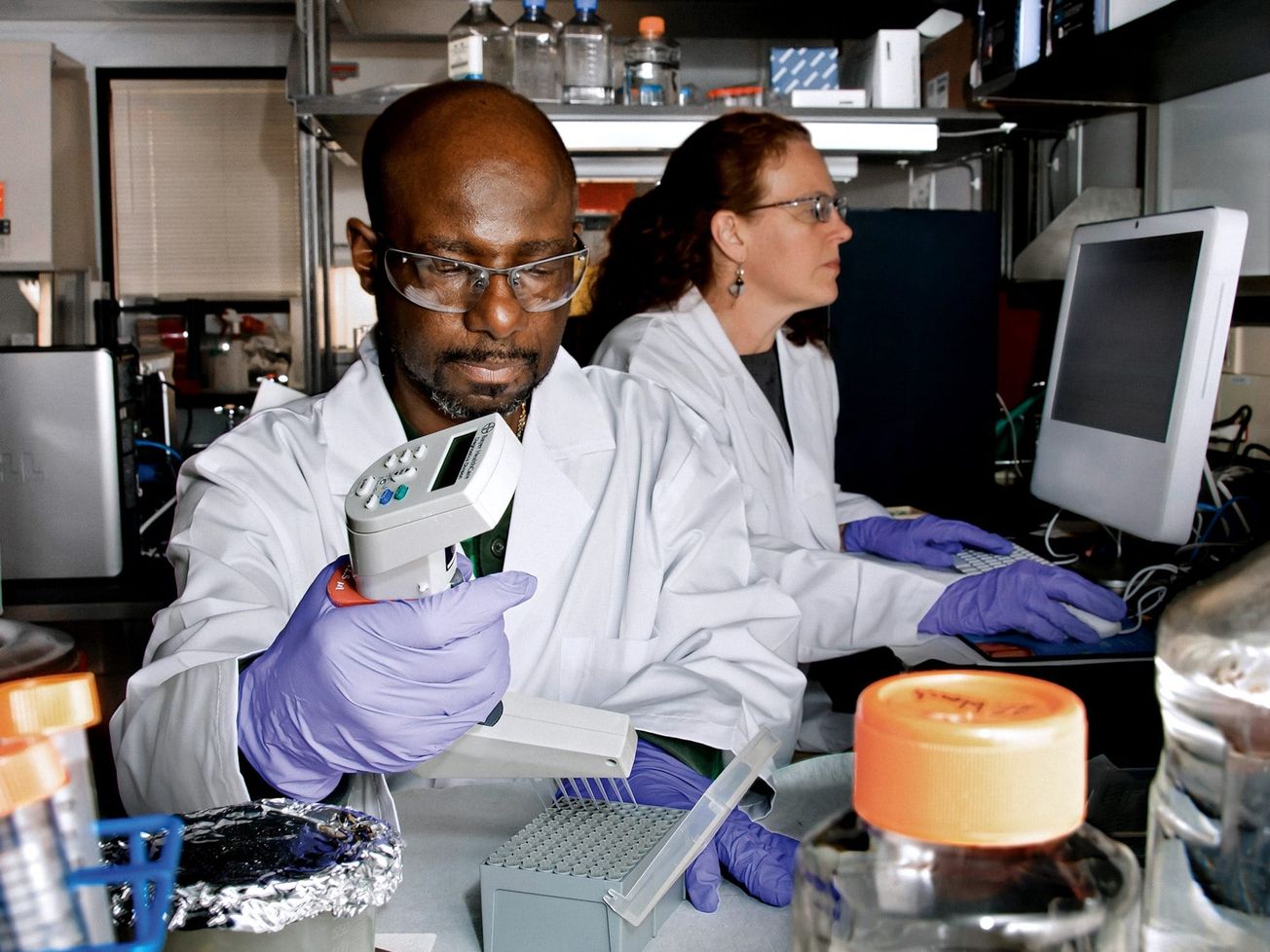 Researchers analyze the molecular structure of HIV. 