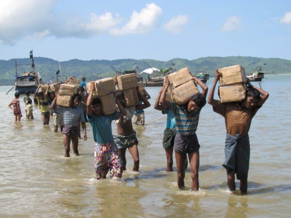 Rohingya refugees at a Myanmar camp accessible only by sea