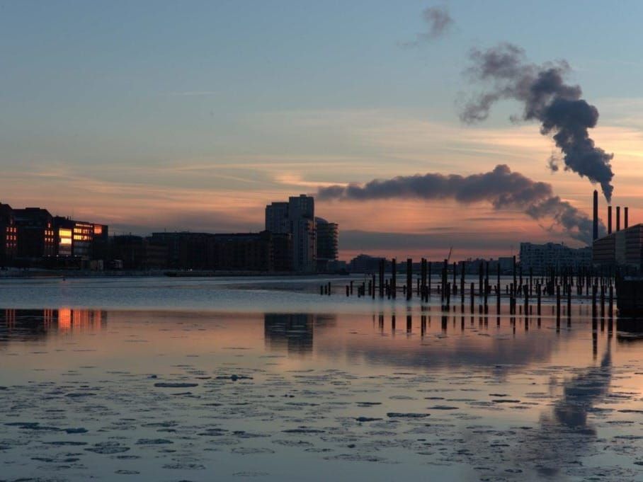 A smoke plume from a factory in Denmark bends in a temperature inversion