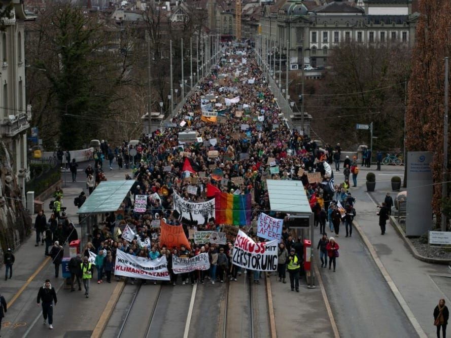 An estimated 4,000 climate protesters took to the streets of the Swiss capital.