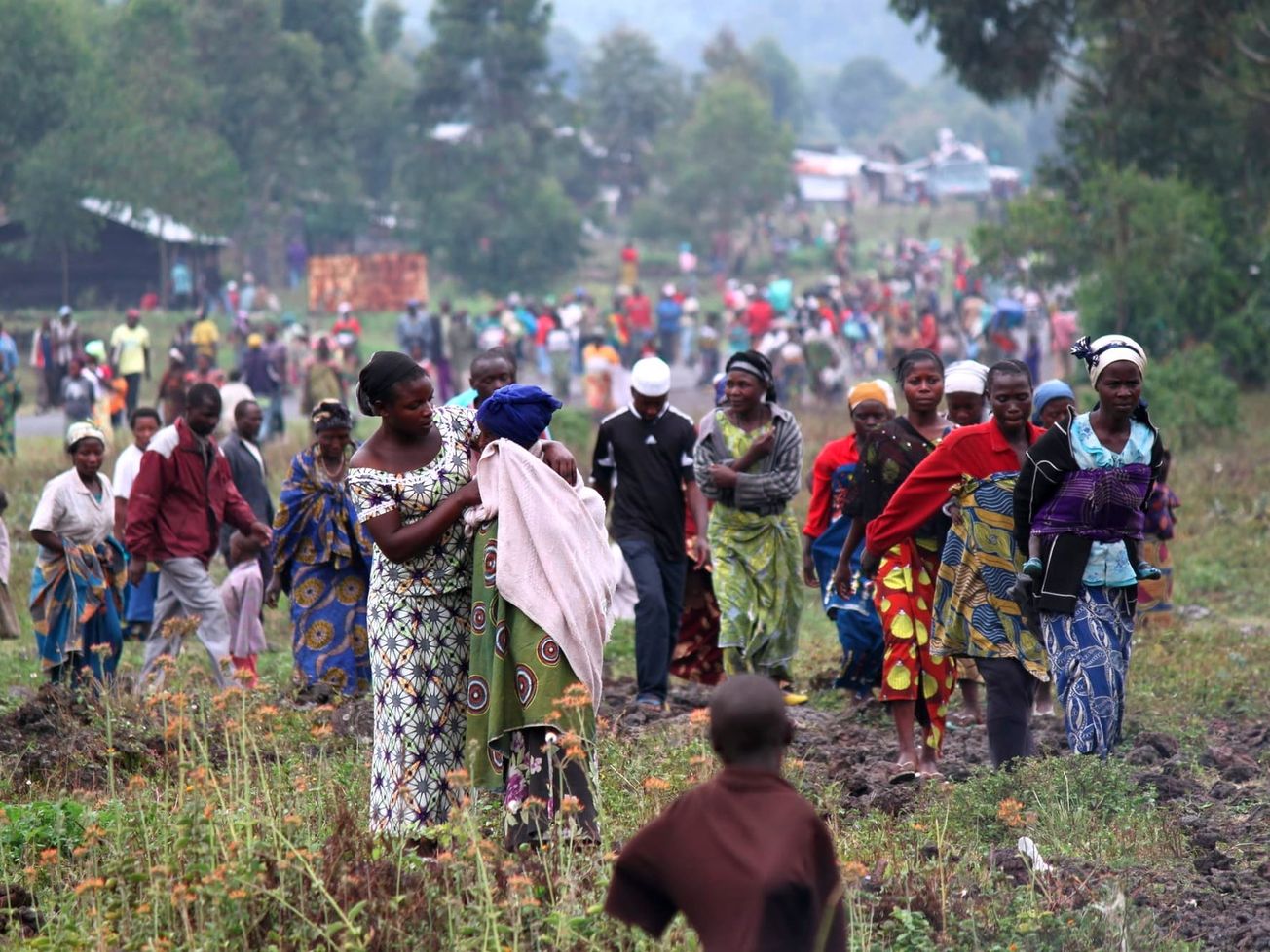 New arrivals pour into Congo's Kibati camp on the edge of Goma in 2012.