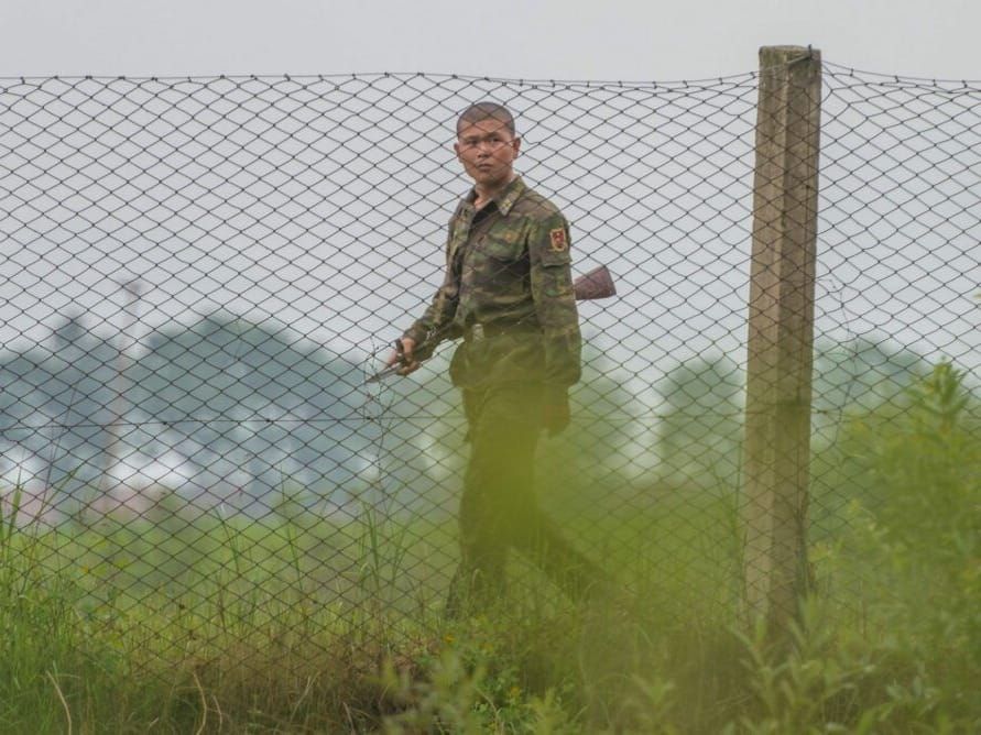 A North Korean soldier patrols the border with China.