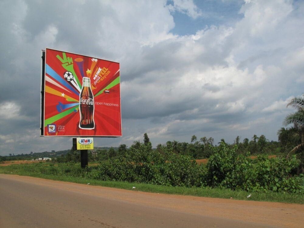 A sign of foreign investment on the road in Northern Uganda.