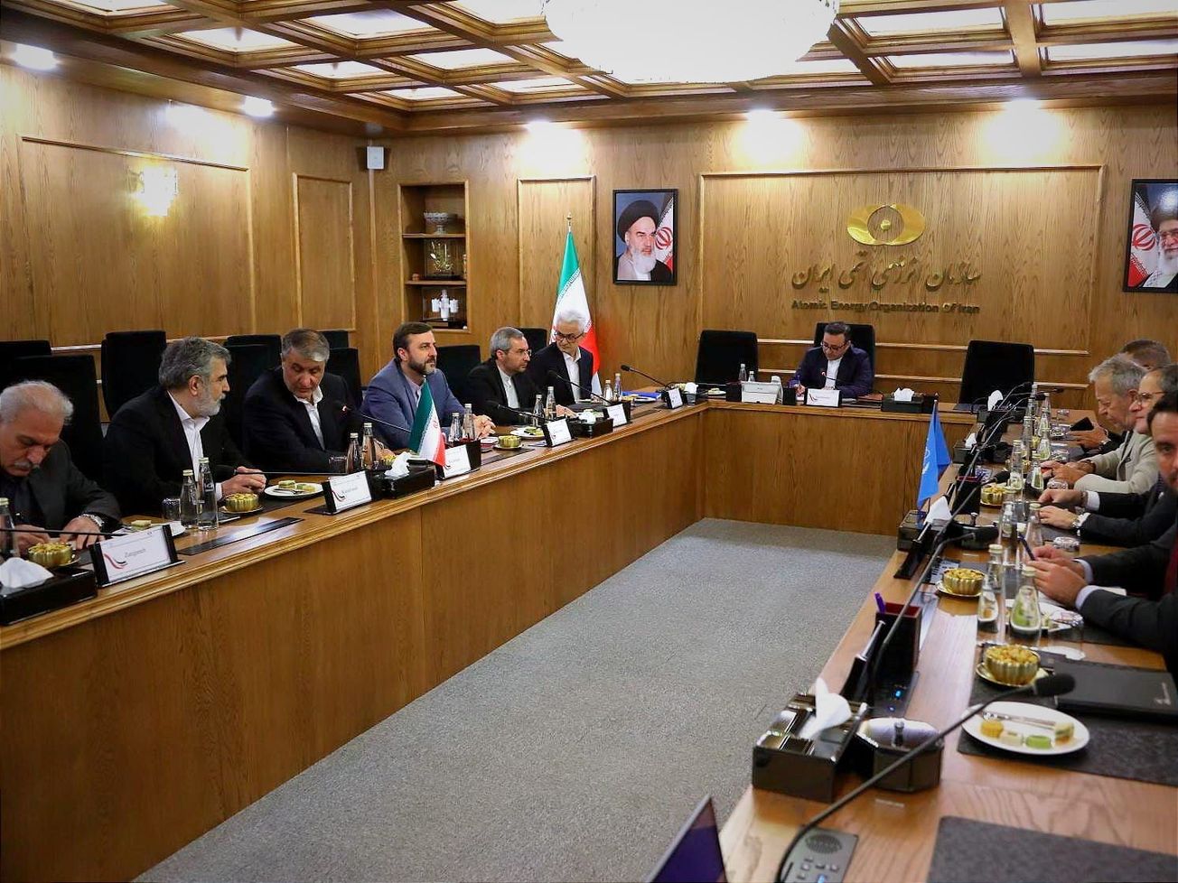 The head of the U.N. nuclear watchdog agency visited Tehran and met with Iran's top nuclear official.