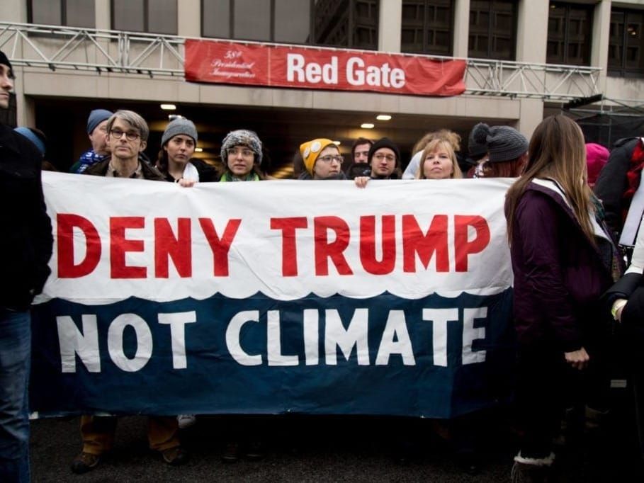 Anti-Trump protesters in Washington focused on his denial of climate science.