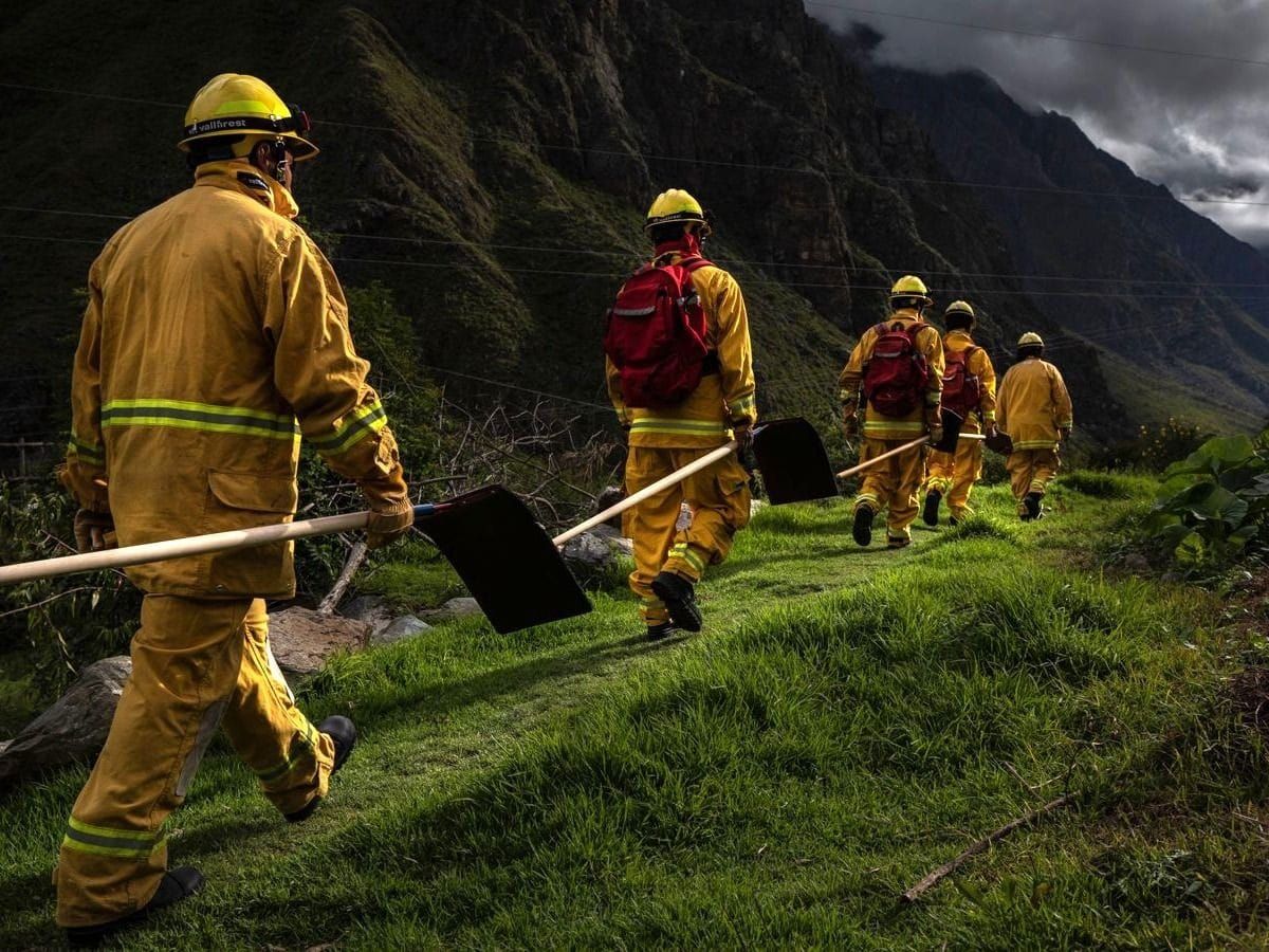 Forest firefighters in Peru's eastern slopes of the Andes, covered with tropical forests of the upper Amazon Basin.