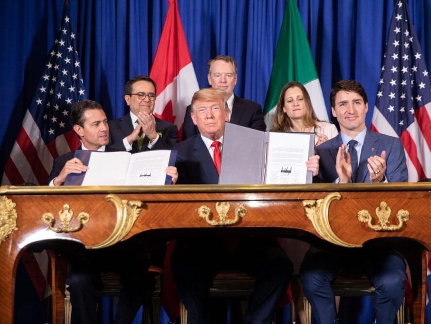 North American leaders at the signing ceremony for a new trade pact