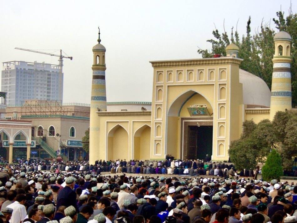 Eid al-Fitr prayers at the Id Kah Mosque, a center of Islamic culture for Muslim Uyghurs in Kashgar, China