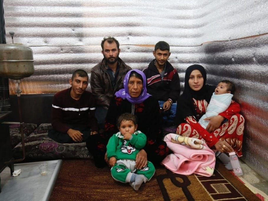 A disabled refugee from Idlib, Syria and his family in Lebanon
