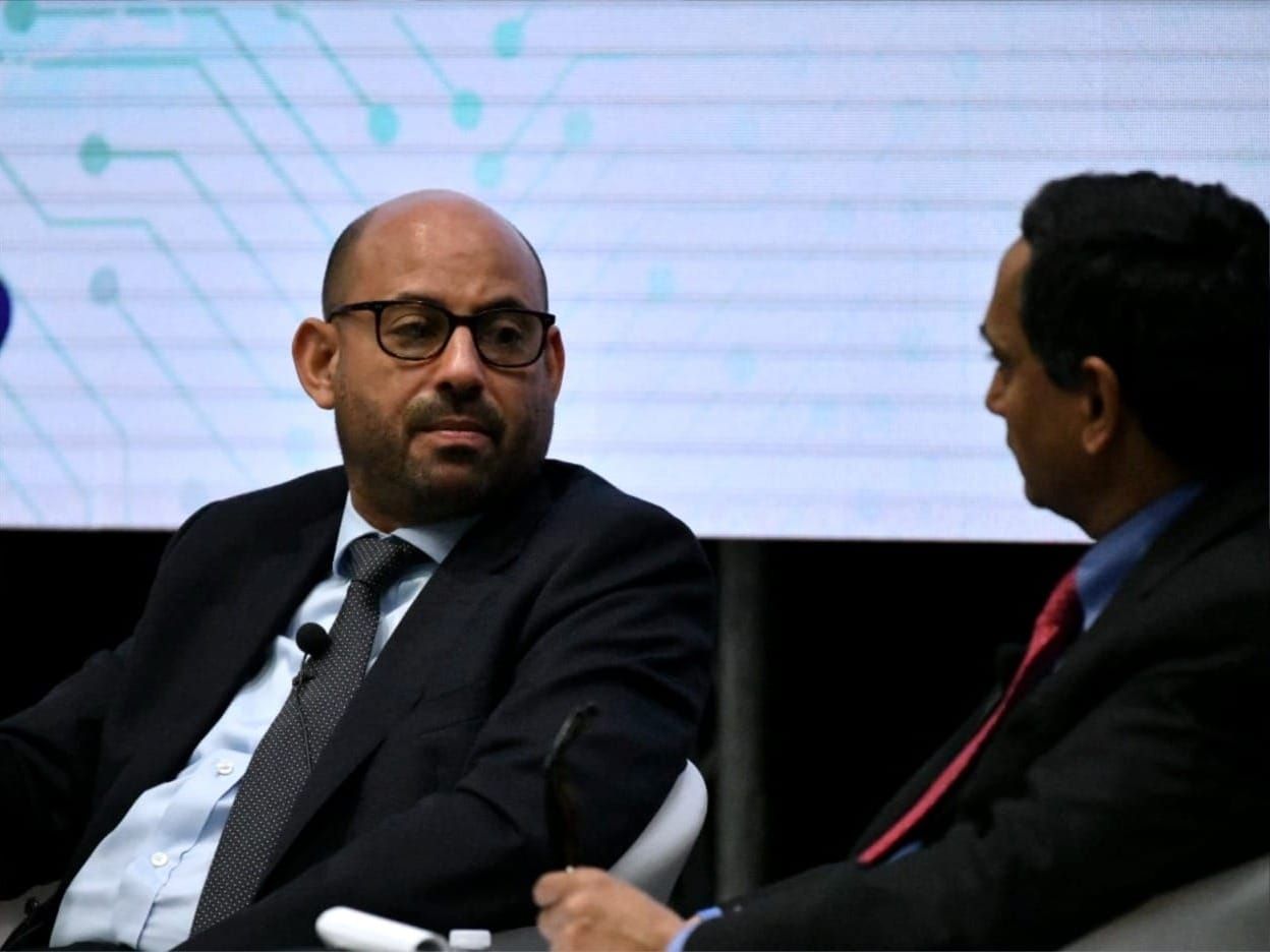 United Nations Climate Chief Simon Stiell, left, at a 2019 Caribbean Forum