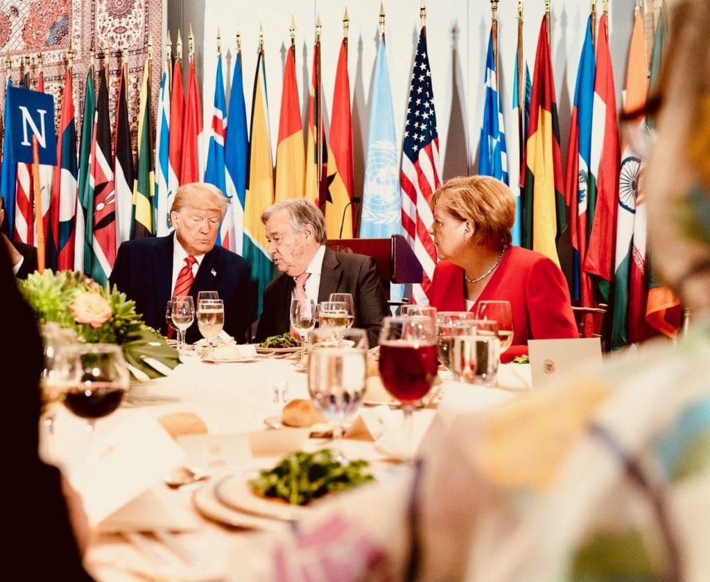 U.N. Secretary-General António Guterres with U.S. President Donald Trump and German Chancellor Angela Merkel 