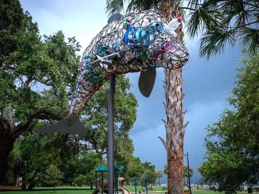 A sculpture of a bottle-nosed dolphin filled with bottles and other plastic trash collected from the beach of St. Simons Island, Ga., in the Southeastern United States.