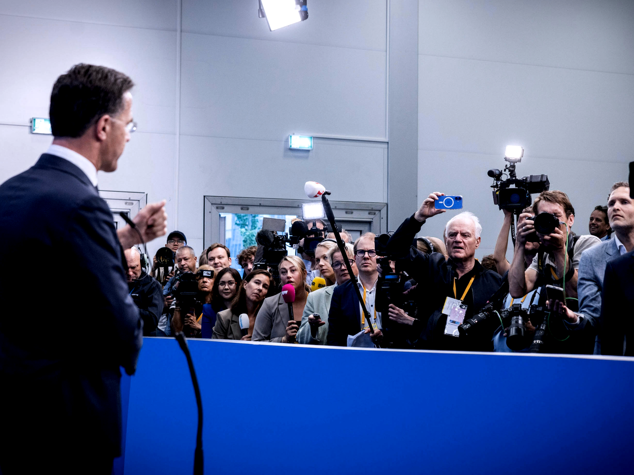 NATO Secretary General Mark Rutte, at left, speaks to reporters at the 2025 NATO Summit in The Hague.