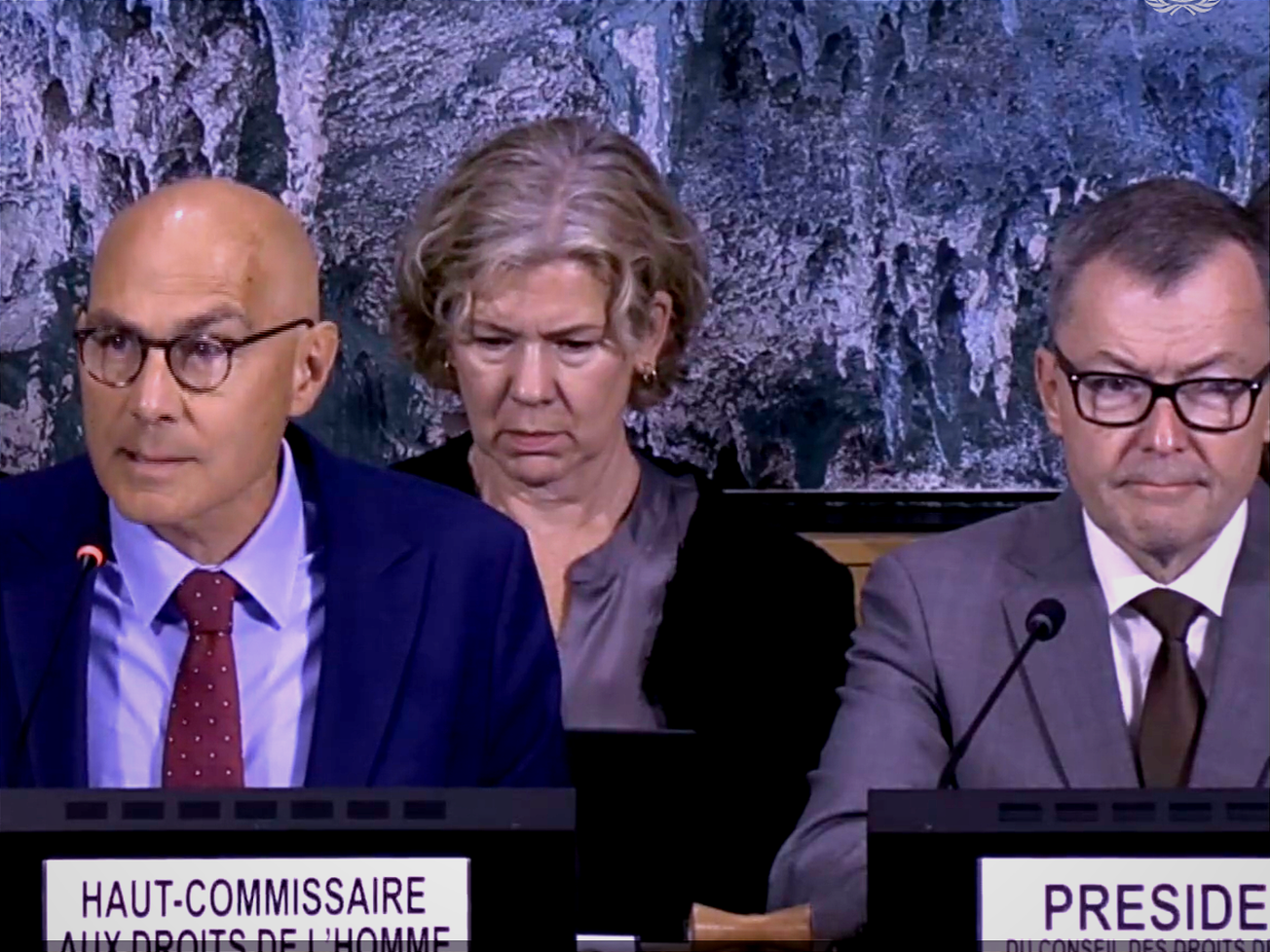 U.N. human rights chief Volker Türk, left, and U.N. Human Rights Council President Jürg Lauber, the Swiss U.N. ambassador, right, preside over a new council session.