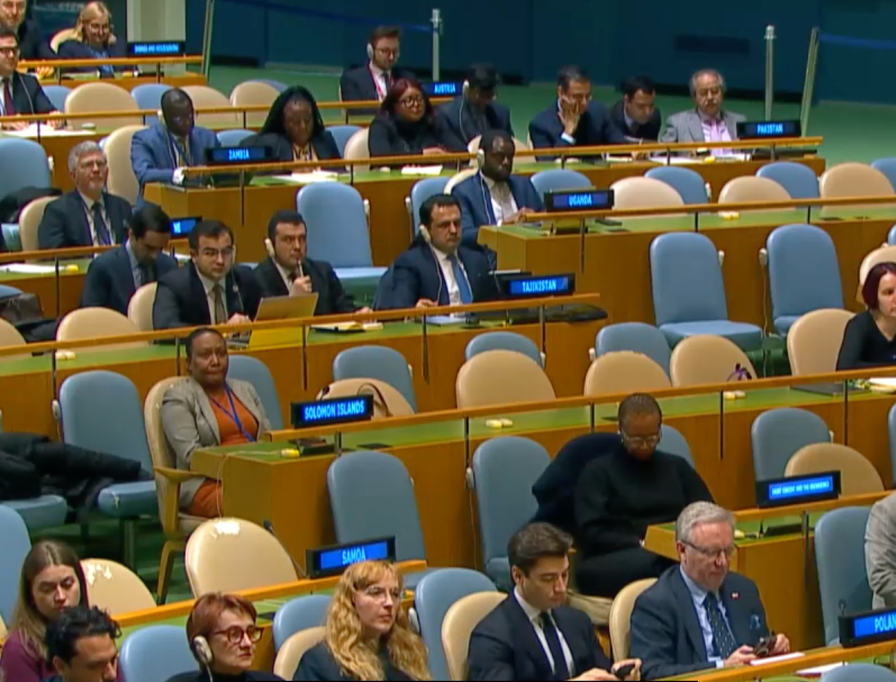 Diplomats listen to the U.N. chief's speech to the General Assembly. 