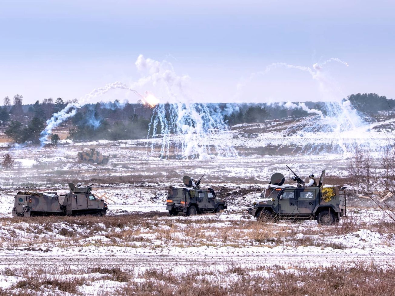 NATO troops engage targets during a live‑fire exercise on the training range during an exercise in February 2026.