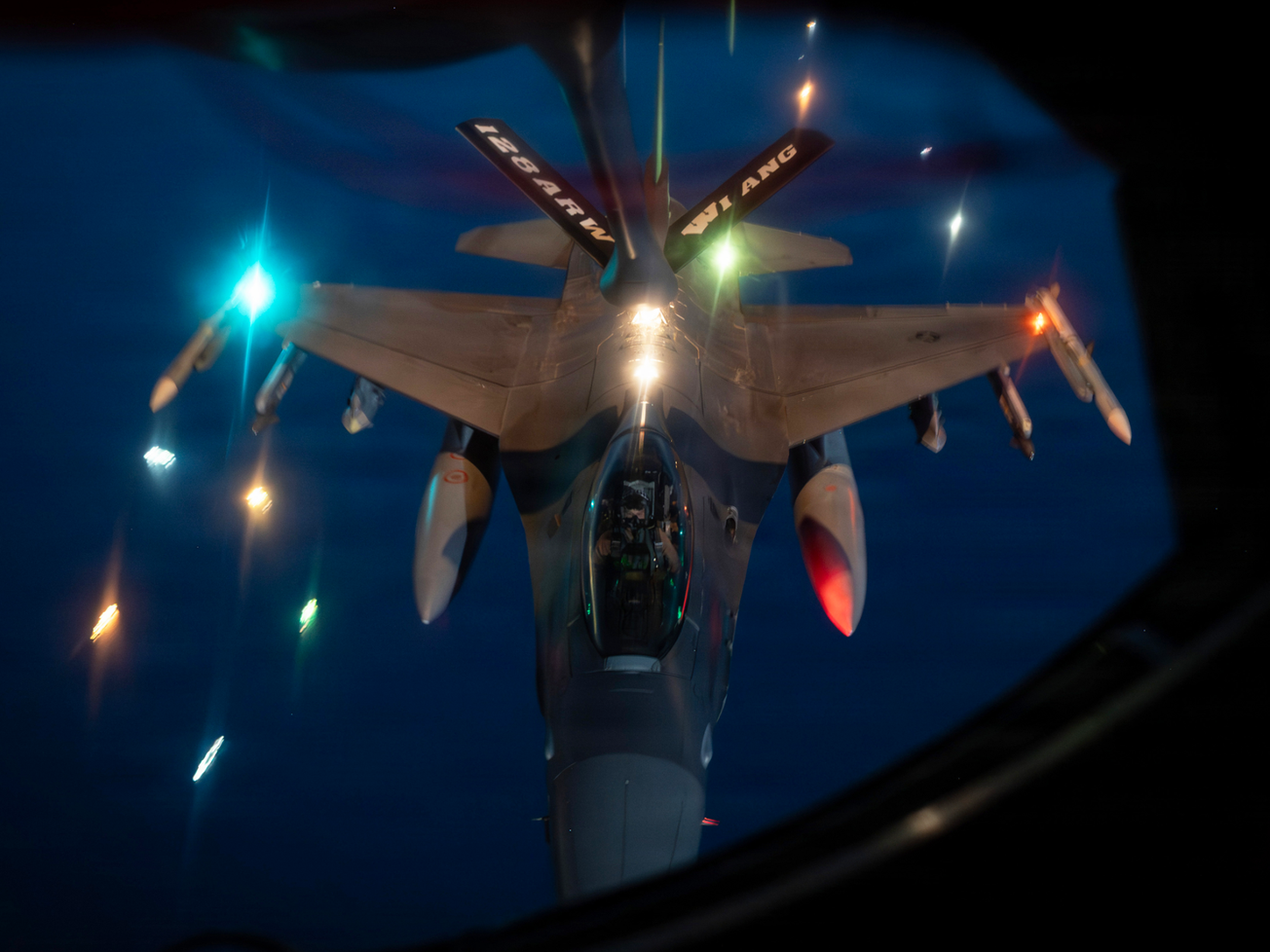 A U.S. Air Force F-16 Fighting Falcon aircraft refuels from a KC-135 Stratotanker aircraft during Operation Epic Fury on April 2, 2026. 