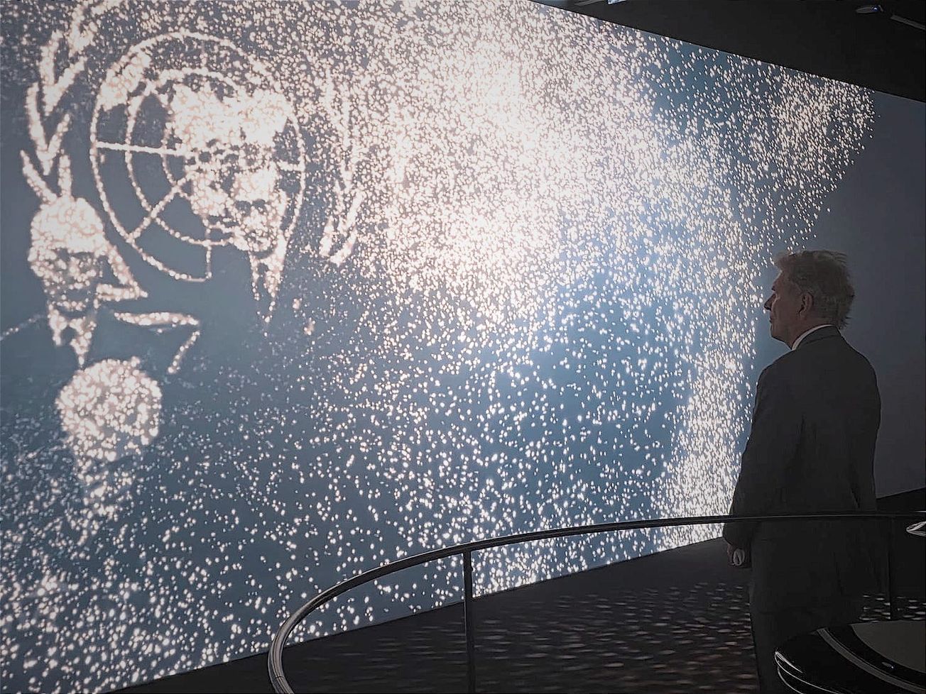 Philanthropist Ivan Pictet, former head of Pictet Group, the largest privately held Swiss private bank, watches an immersive exhibit at the new Portail des Nations.