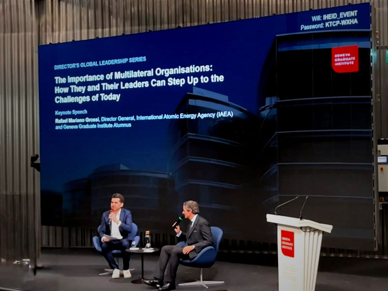 Grégoire Mallard, at left, speaks with Rafael Mariano Grossi at the Geneva Graduate Institute on June 18, 2026. 