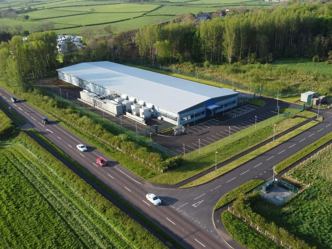 A data center built in Coleraine, a low electrical consumption area of Northern Ireland, minimizes localized grid strain.