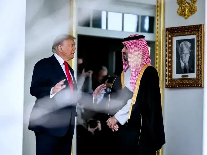 U.S. President Donald Trump speaks with Saudi Crown Prince Mohammed bin Salman Al Saud at the White House in November 2025. 