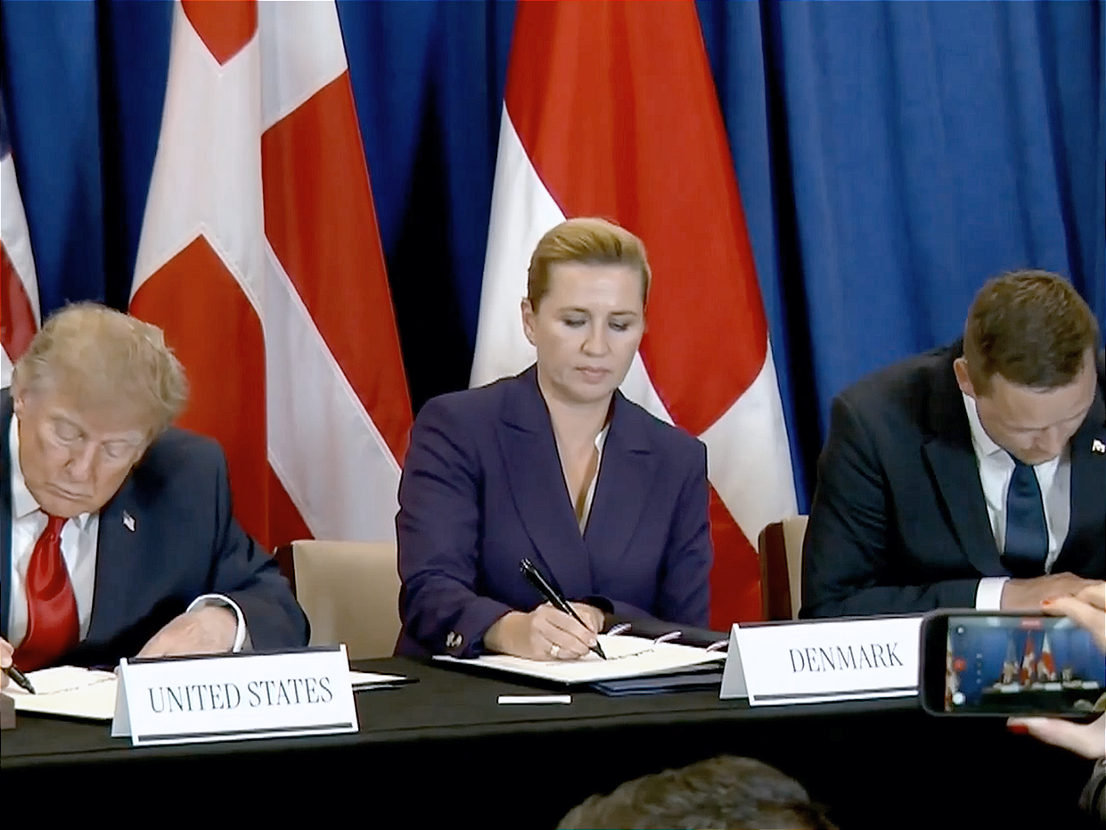 U.S. President Donald Trump, Prime Minister Mette Frederiksen of Denmark and Prime Minister Jens-Frederik Nielsen of Greenland sign a security pact on Sept. 22, 2026.